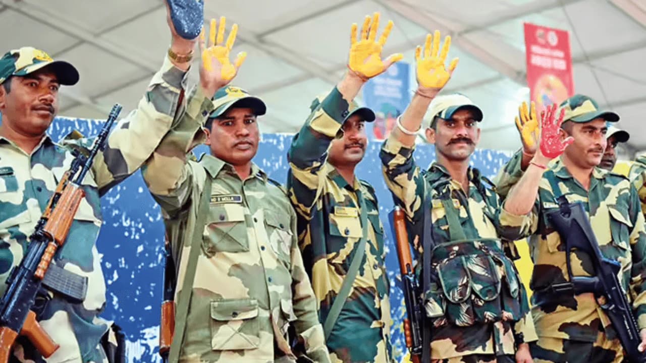 Security personnel participating in the handprint artwork